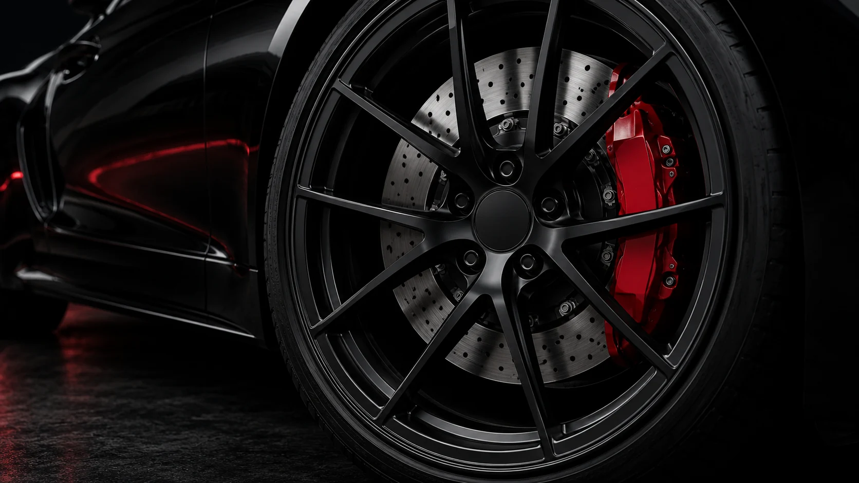 Performance wheel with a ventilated brake disc and red caliper