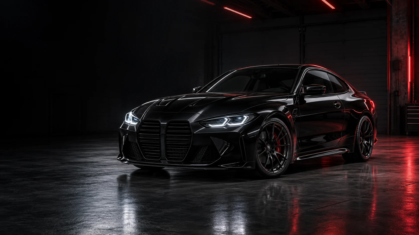 Black performance coupe under red lighting in a dark garage